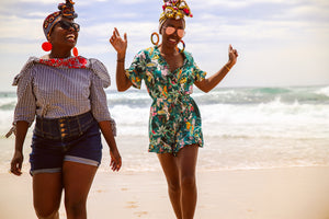 2 women smiling at the beach wearing head wraps | sydney, Australia 